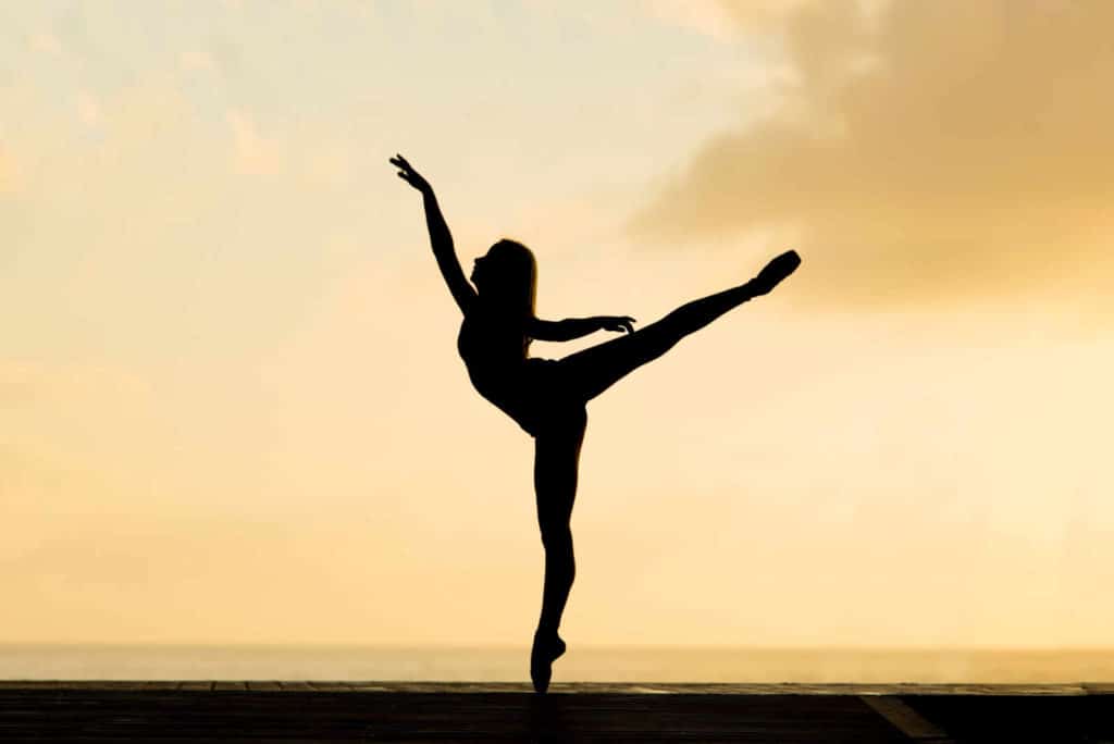 Dancer expressing freedom found in energy healing work